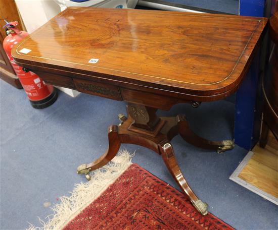 A late Regency rosewood card table W.91cm.